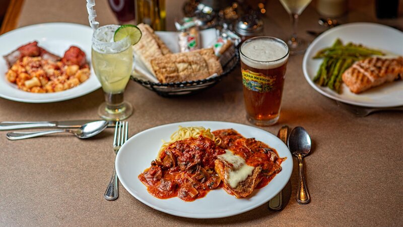 Several dinner entrees with focus on chicken sorrentino