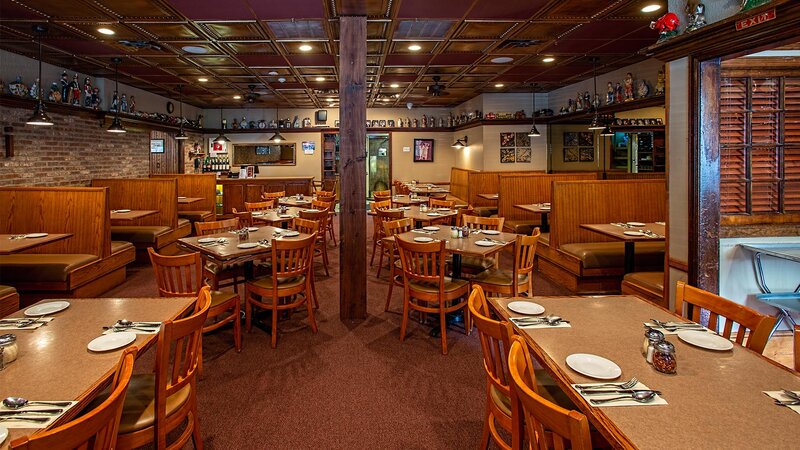 Dining room with view of many set tables